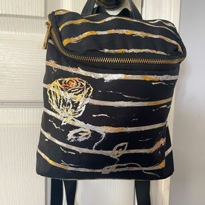 One of a kind convertible backpack/purse
